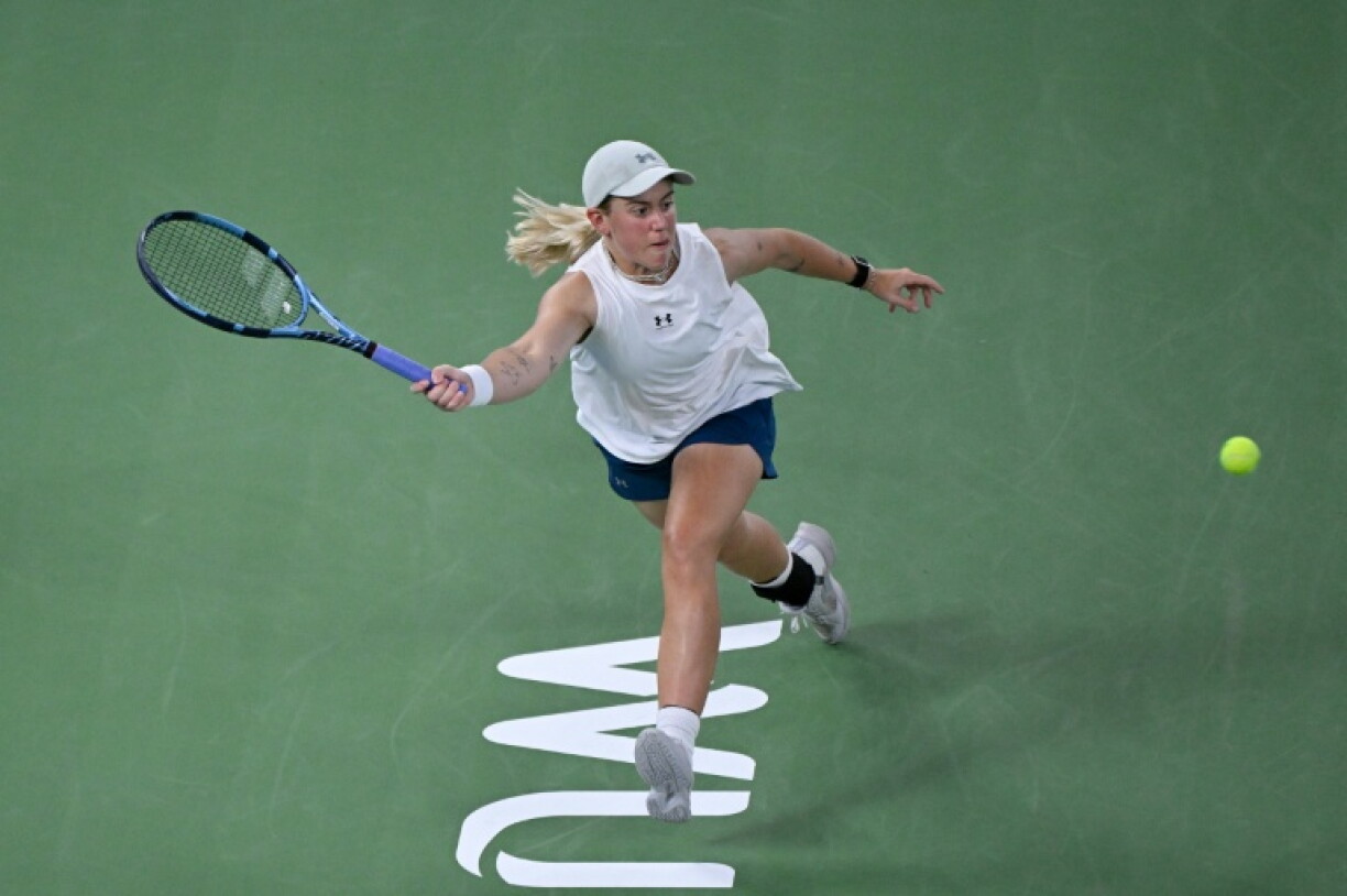 Britain's Sonay Kartal hits a return to Latvia's Jelena Ostapenko