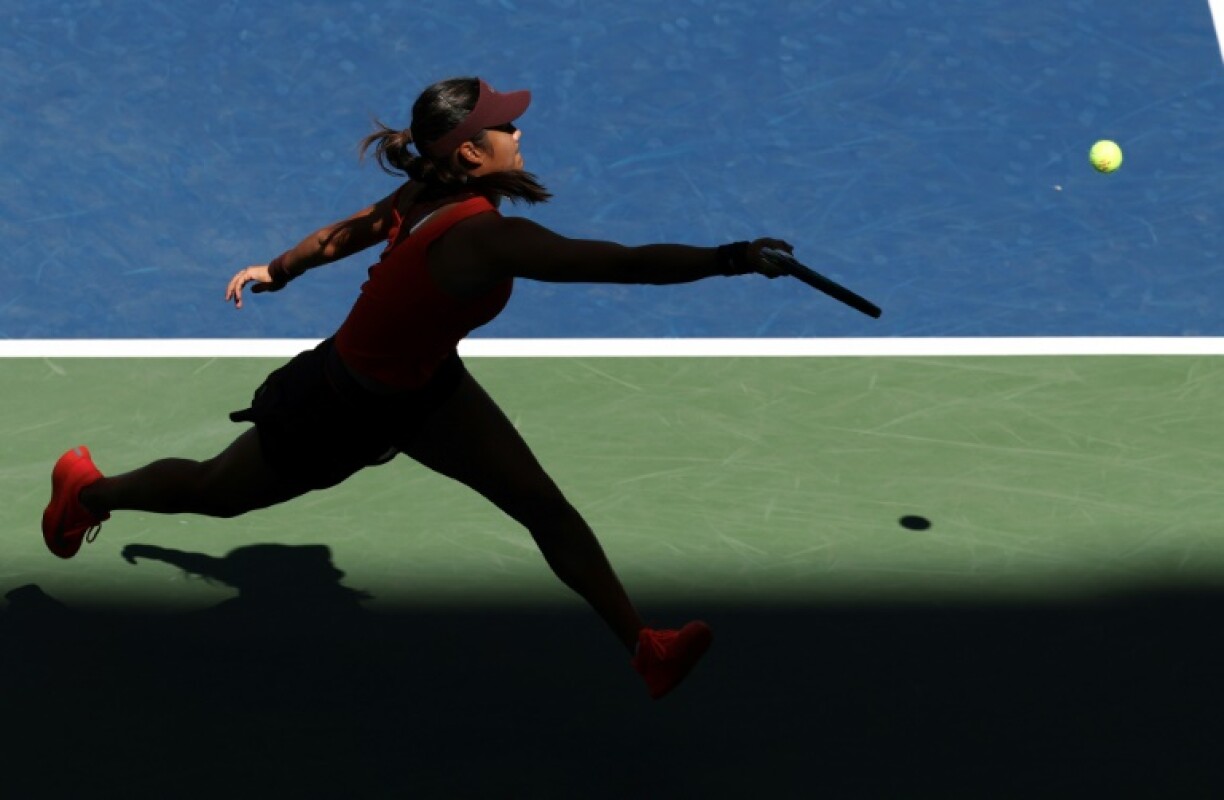 Britain's Emma Raducanu makes a return on her way to victory over Indonesia's Janice Tjen at the US Open