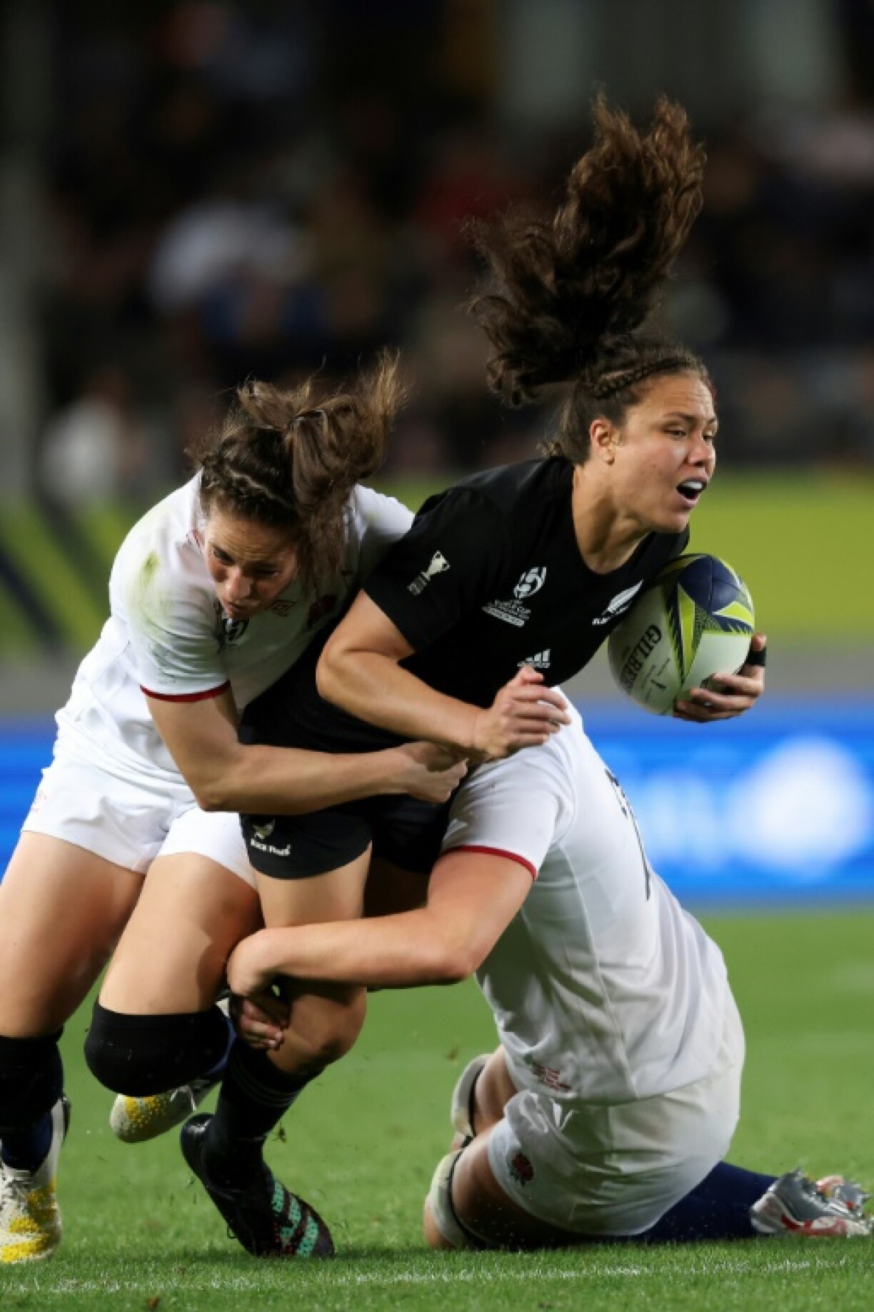 New Zealand's Ruby Tui hits the English tacklers during the 2021 Women’s Rugby World Cup final at Eden Park