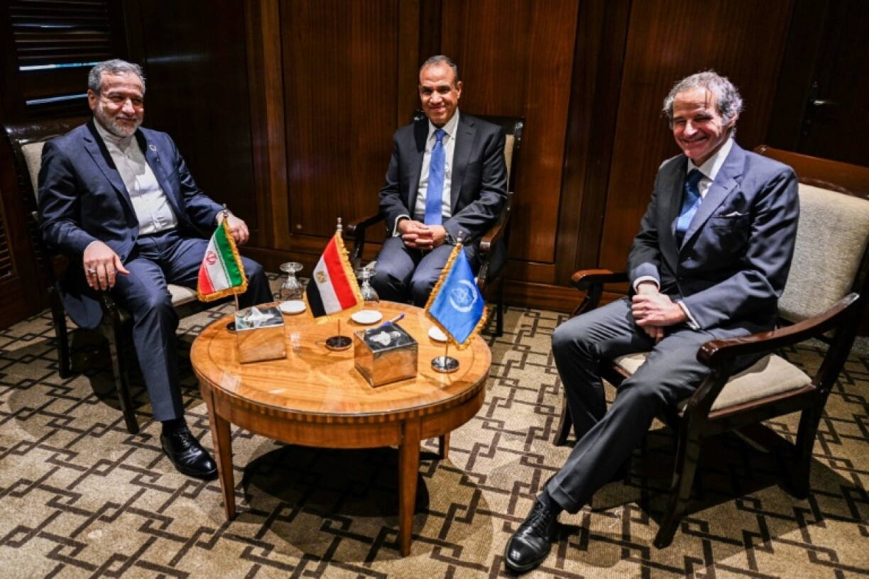 Egypt's Foreign Minister Badr Abdelatty (C) meets with his Iranian counterpart Abbas Araghchi (L) and Rafael Grossi, Director General of the International Atomic Energy Agency in Cairo
