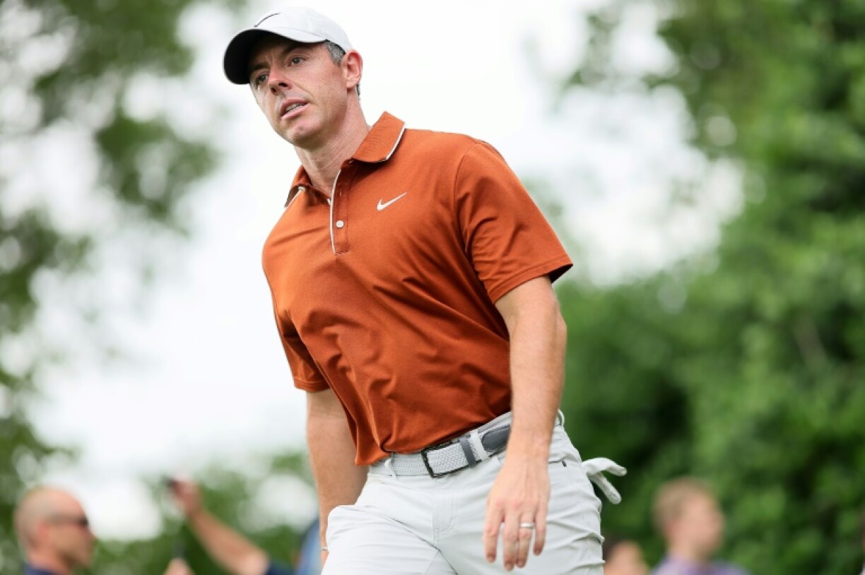 Reigning Masters champion Rory McIlroy of Northern Ireland was among those delayed by bad weather that postponed the start of the third round of the PGA Championship at Quail Hollow