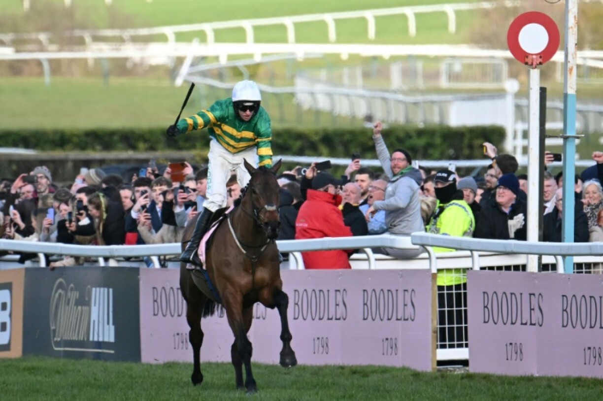 Jockey Mark Walsh celebrates on Inothewayurthinkin after winning the Cheltenham Gold Cup
