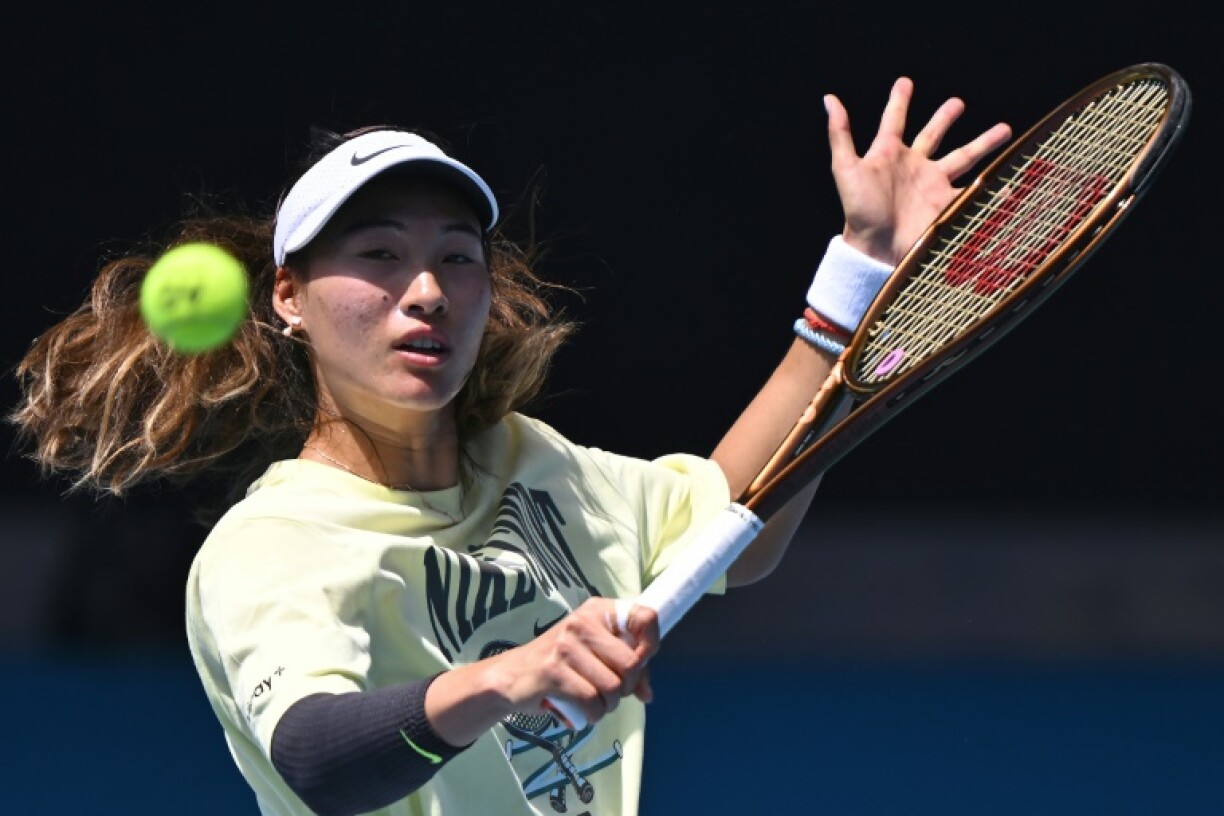 China's Zheng Qinwen hits a return during a practice session ahead of the Australian Open