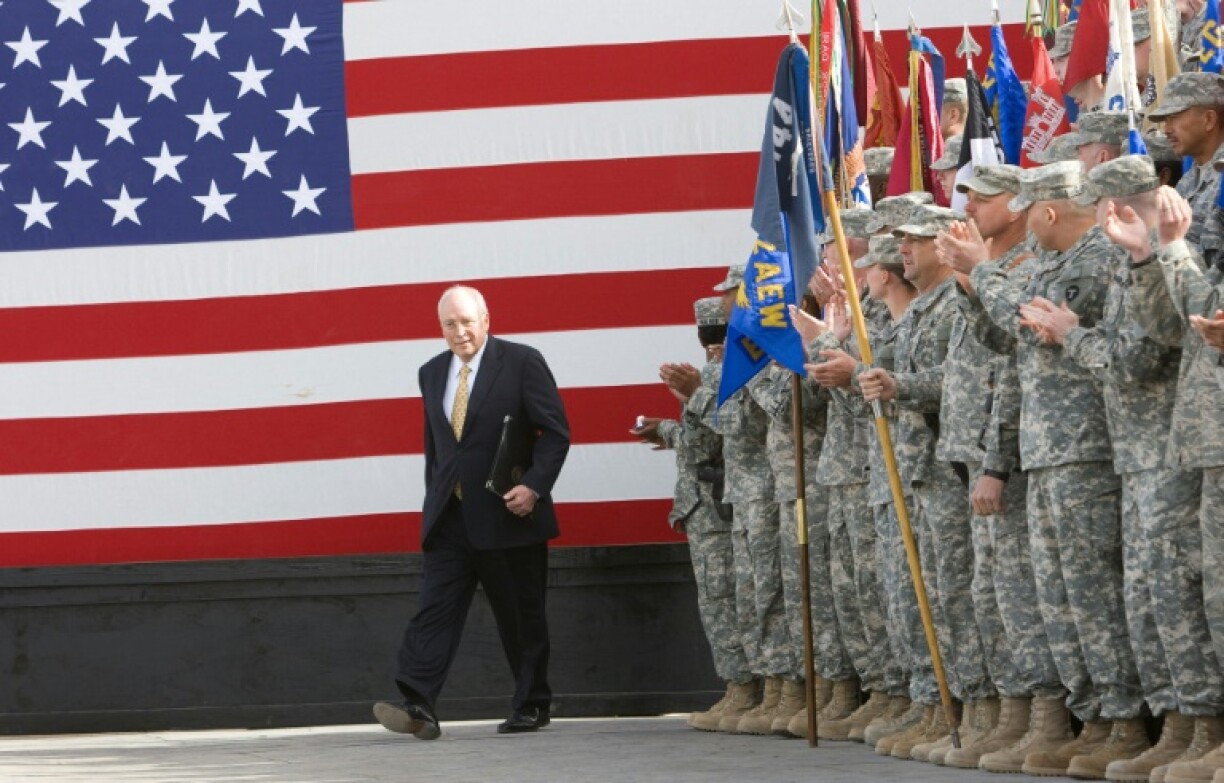 US Vice President Dick Cheney takes to the stage on March 18, 2008 to deliver remarks to US troops stationed at Balad Air Base, Iraq