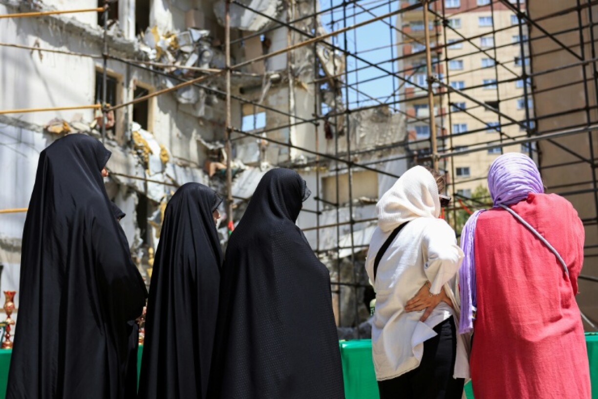 Israel struck major Iranian cities including Tehran, hitting military sites, government buildings and some residential areas