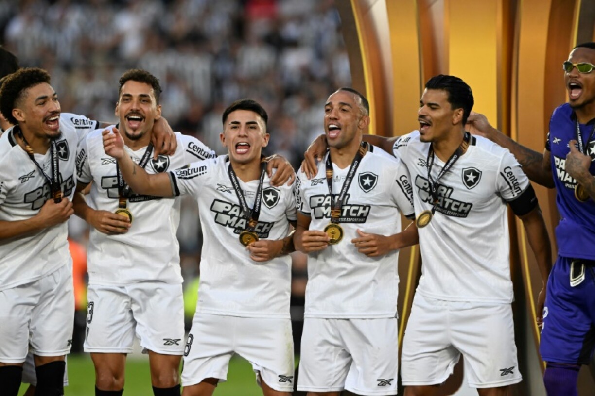 Botafogo players celebrate after winning the Copa Libertadores final over fellow Brazilian club Atletico Mineiro