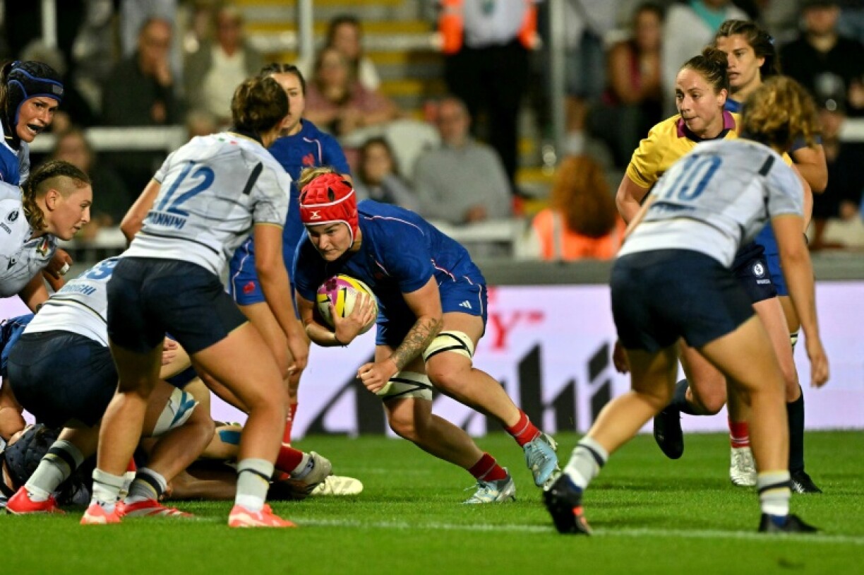 France flanker Charlotte Escudero runs in to score a try during a 24-0 Women's Rugby World Cup Pool D win over Italy in Exeter