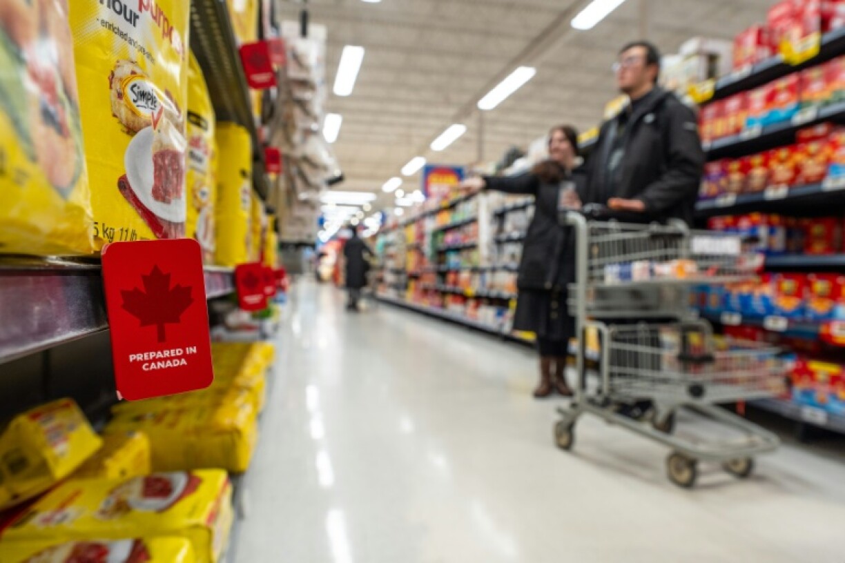 Canadians have seen exports surge but lower household spending as US President Donald Trump's tariffs begin to bite, new government figures show