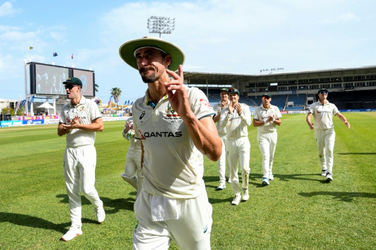 Mitchell Starc walks off the field at tea