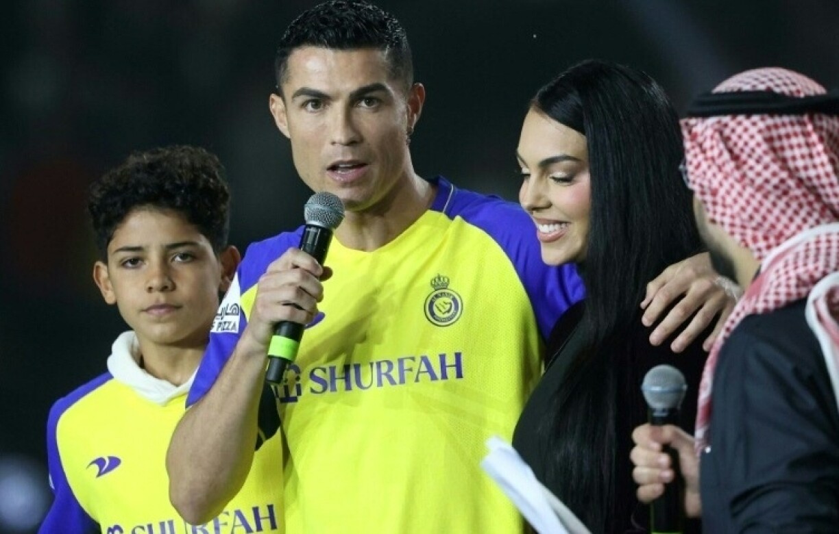 Portuguese forward Cristiano Ronaldo (C-L), his partner Georgina Rodriguez (C-R) and son Cristiano Ronaldo Jr in the Saudi capital Riyadh on January 3, 2023