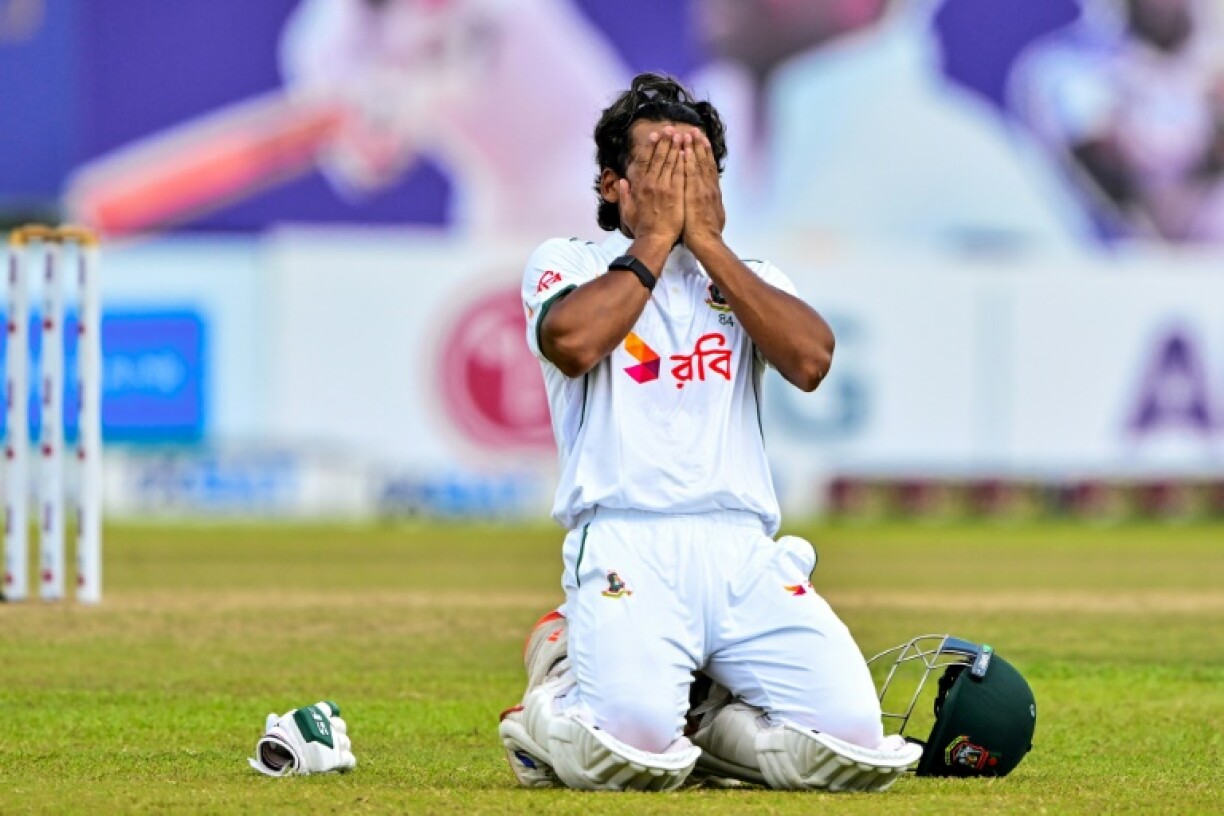 Bangladesh's captain Najmul Hossain Shanto celebrates after scoring a century during the fifth and final day of the first Test cricket match against Sri Lanka
