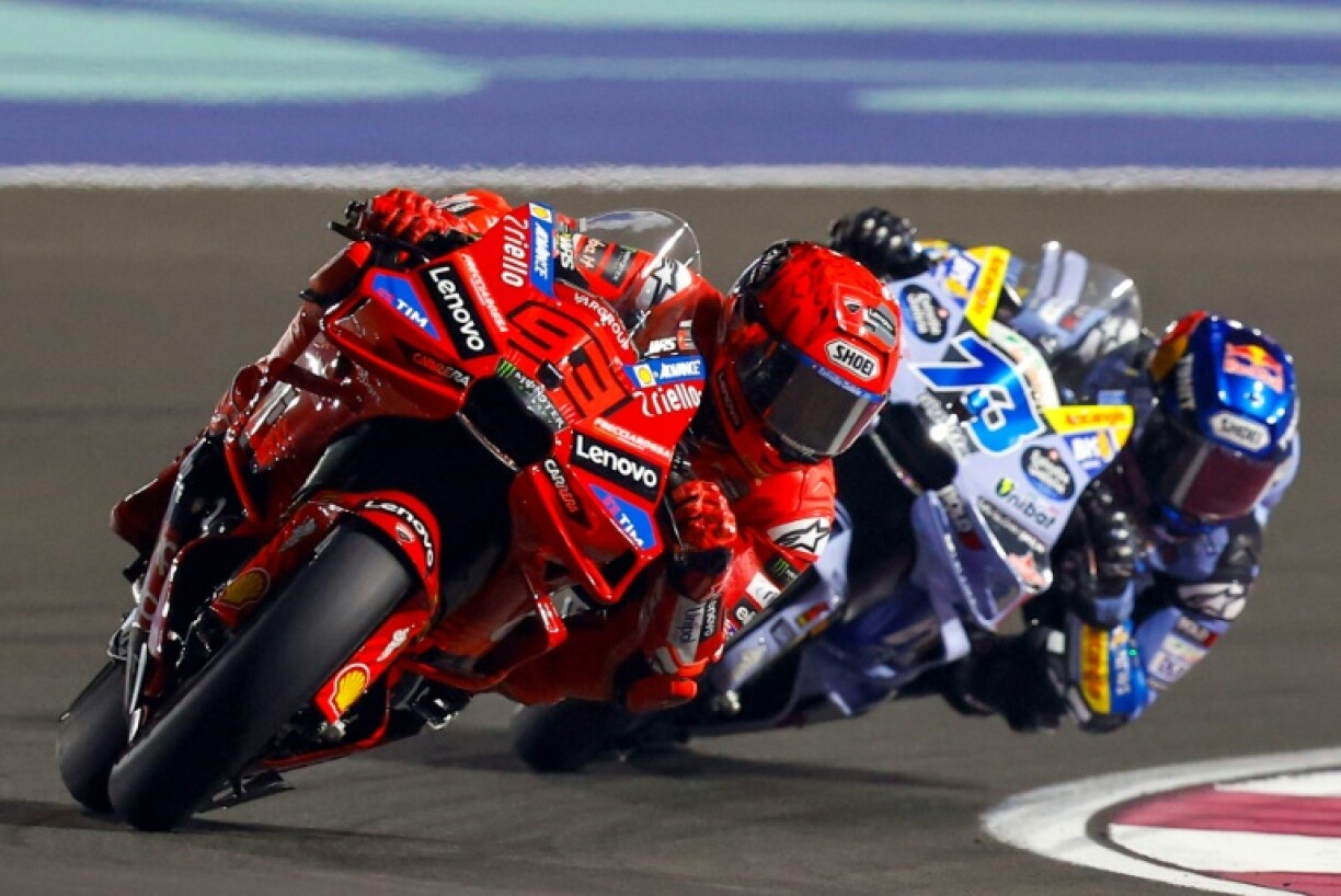 Marc Marquez held off his brother Alex Marquez to win the Qatar MotoGP