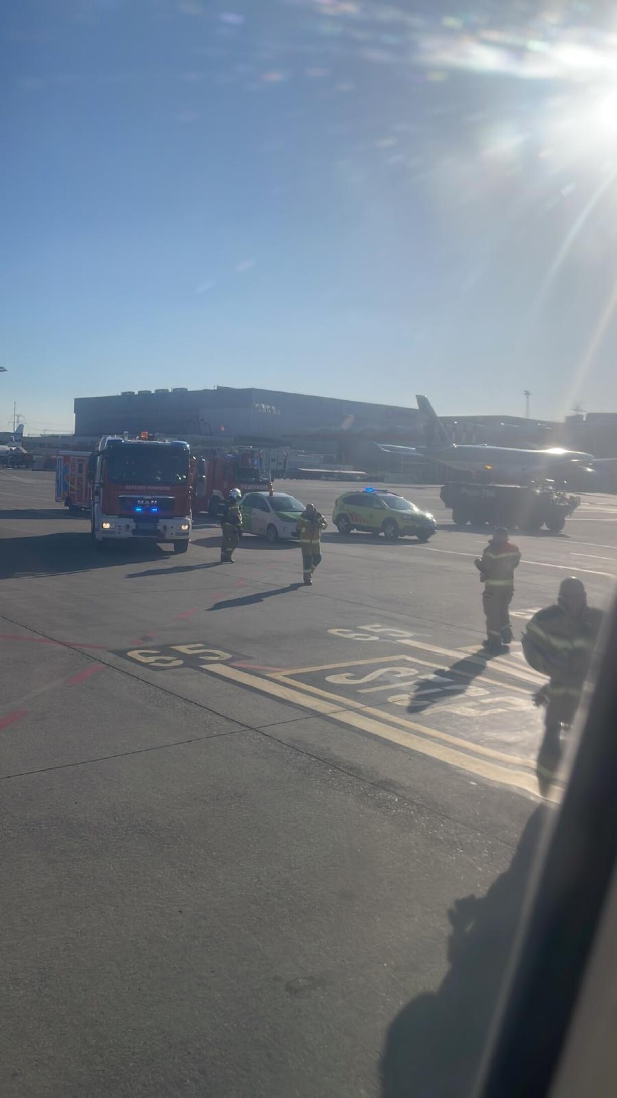 Firefighters awaited the arrival of the Luxair plane in Geneva.