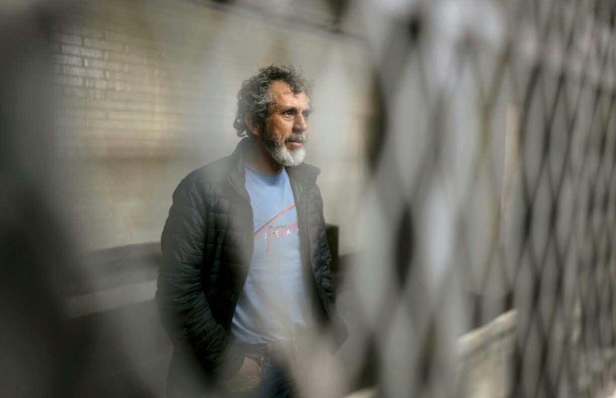 Aler Baldomero Samayoa, alleged leader of the Los Huistas drug cartel, waits in a courthouse jail in Guatemala City