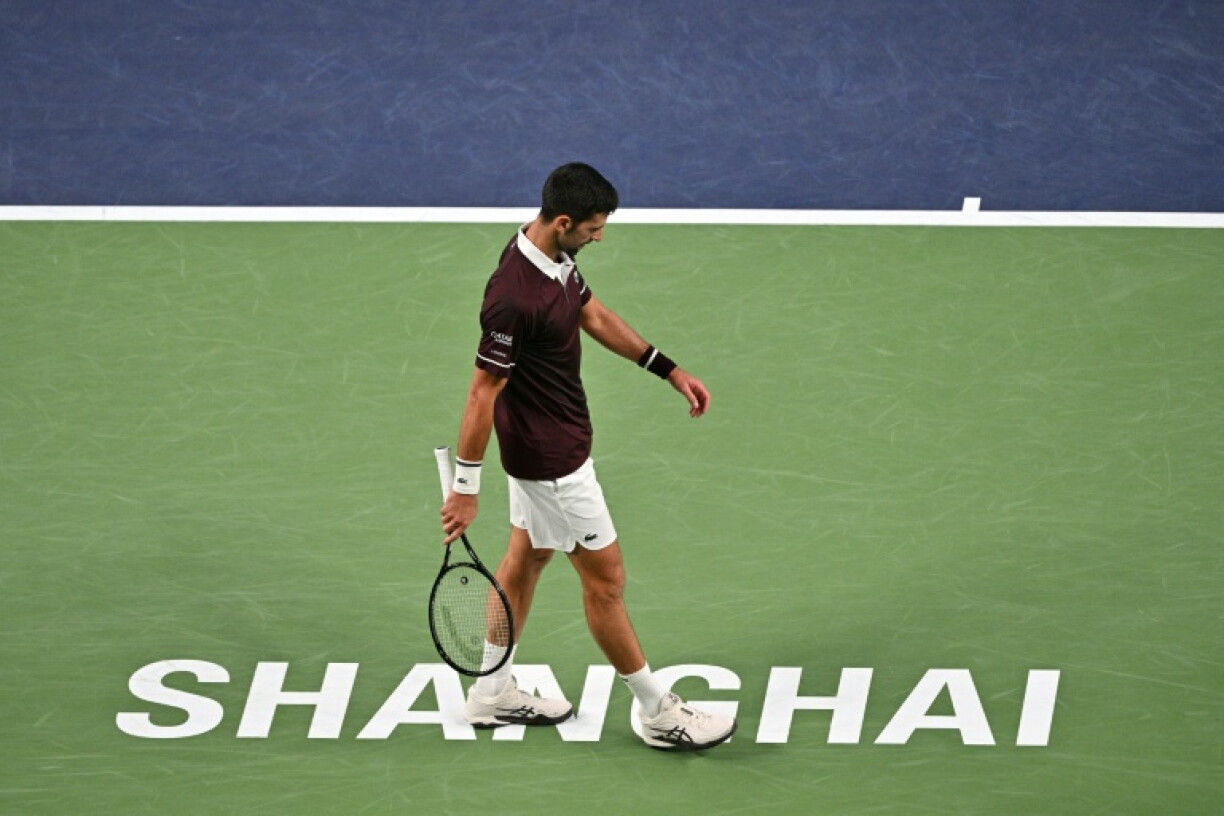 Serbia's Novak Djokovic walks between points during his match against Poland's Hubert Hurkacz during their men's singles match at the Shanghai Masters tennis tournament in Shanghai on October 9, 2026.