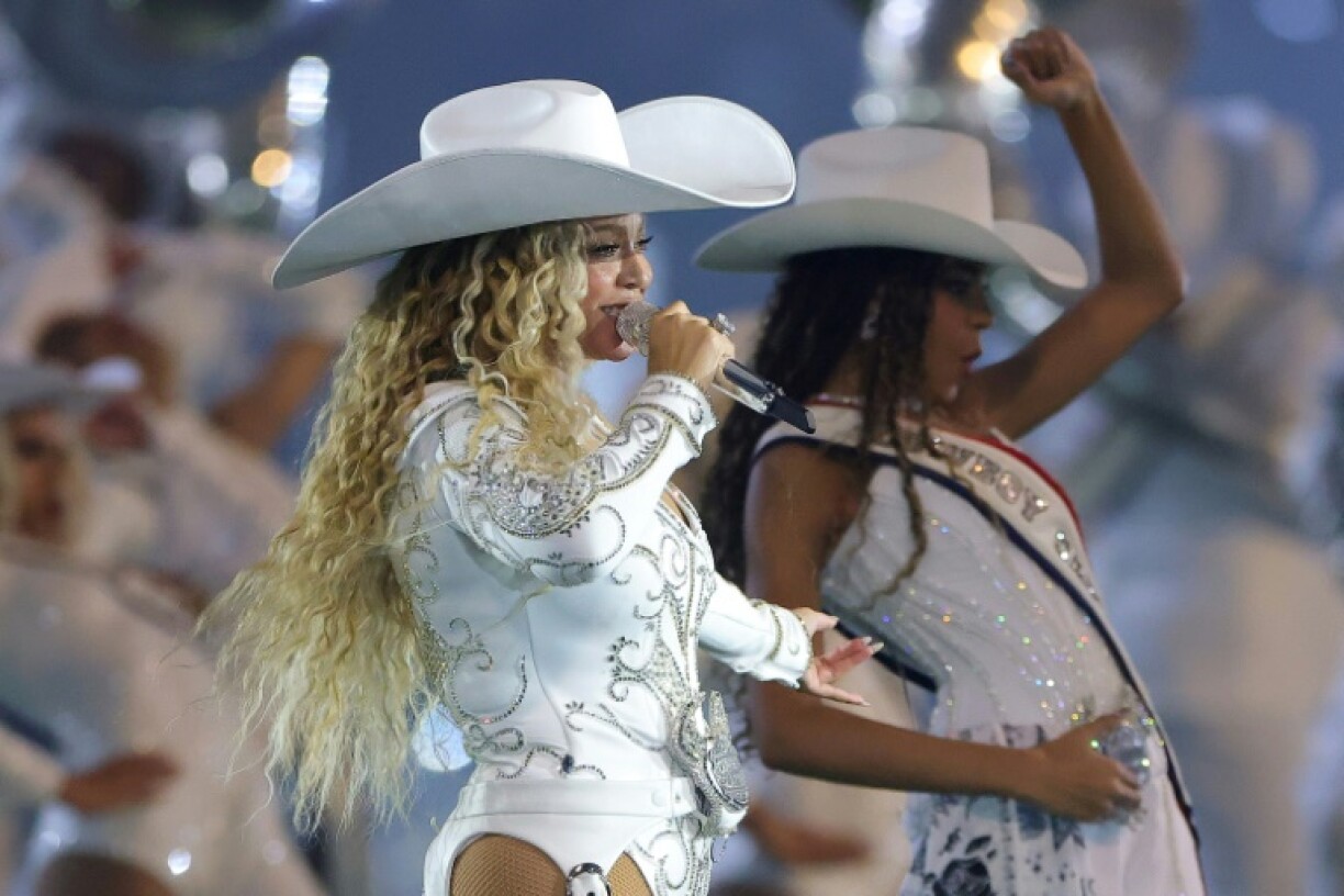 Beyonce, shown here performing with her daughter Blue Ivy during an NFL game on Christmas Day 2024, will head on tour for 'Cowboy Carter' this year