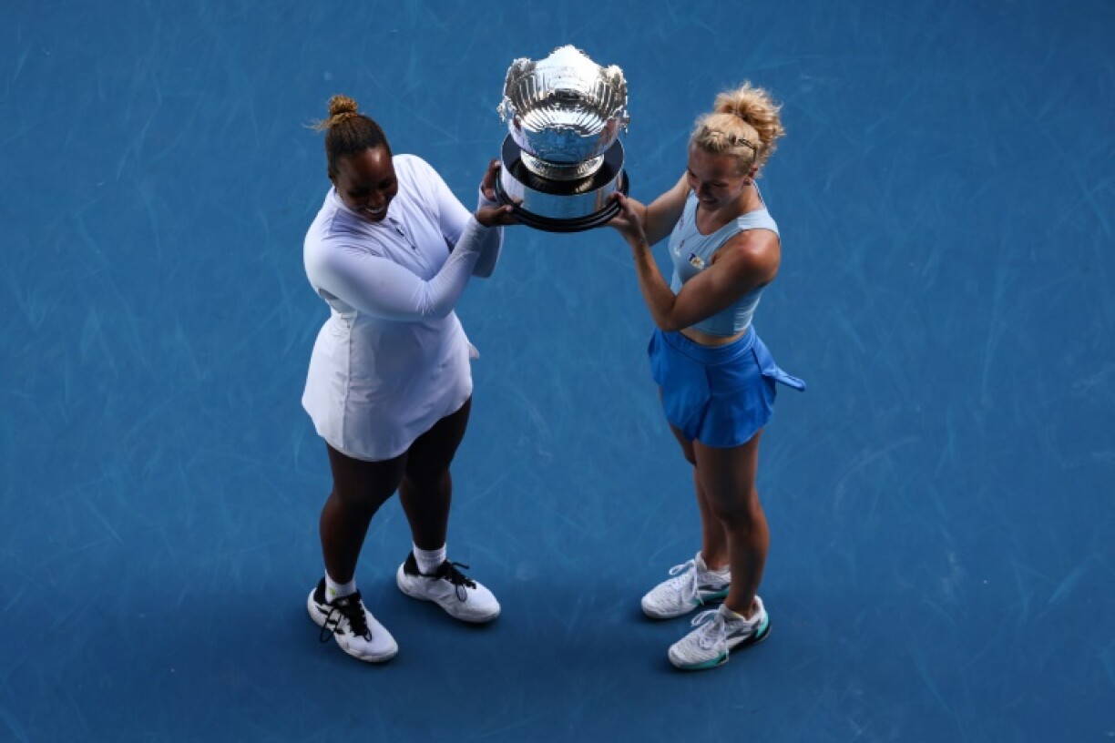 USA's Taylor Townsend (L) and Czech Republic’s Katerina Siniakova after winning the women's doubles title at the Australian Open