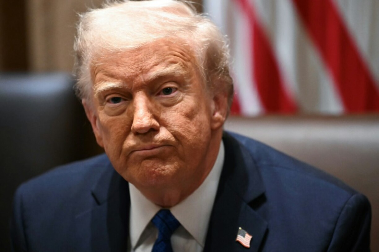 US President Donald Trump said he would 'look into' the use of the Signal app and has put on a united front