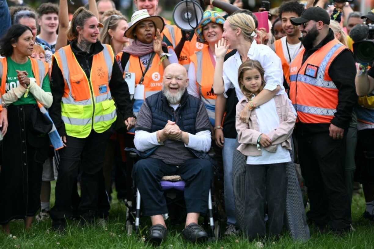 'People that don't like the politics of the event can go somewhere else,' says Glastonbury co-founder Michael Eavis (centre)