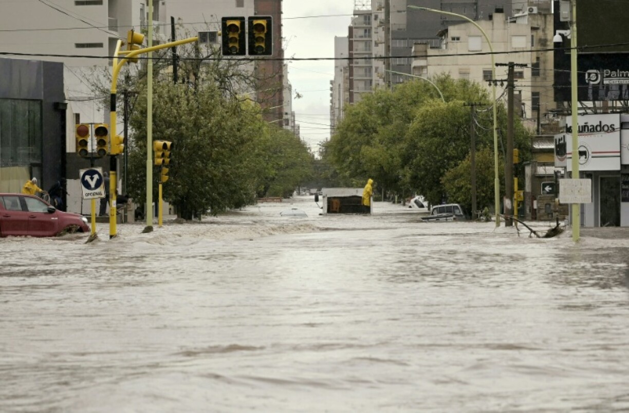 Torrential rains flooded homes and hospitals, destroyed roads and killed at least 16 people in the Argentine port city of Bahia Blanca