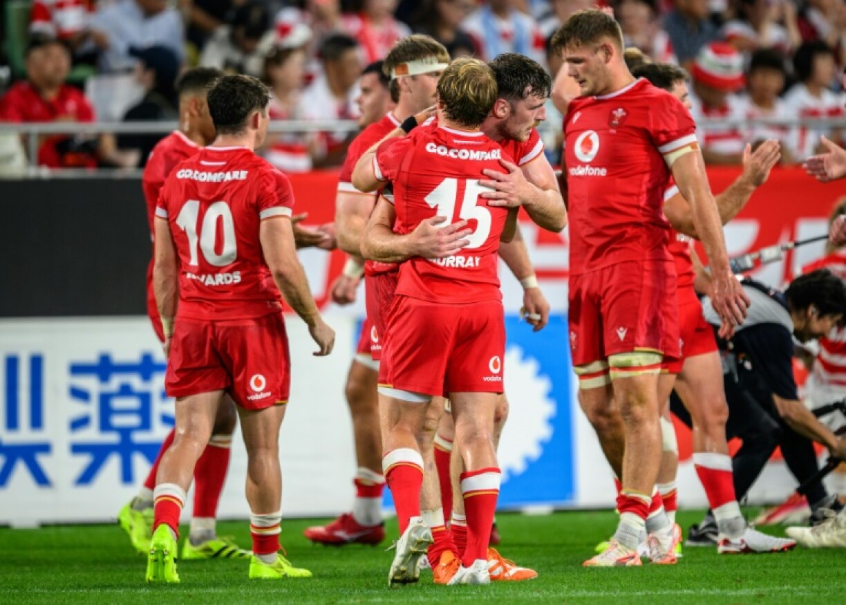 Wales celebrate after beating Japan 31-22 in Kobe on Saturday