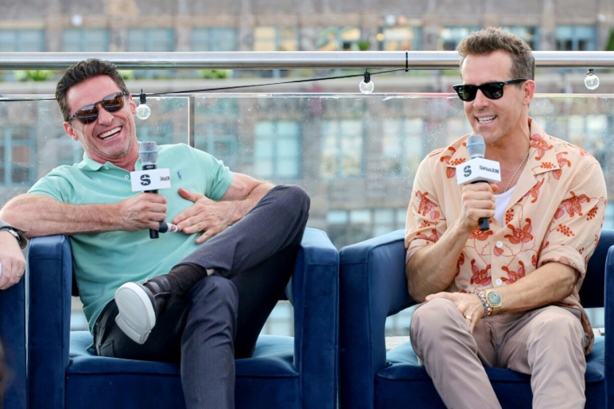 Hugh Jackman (L) and Ryan Reynolds (R) have become co-owners of Australia's SailGP team
