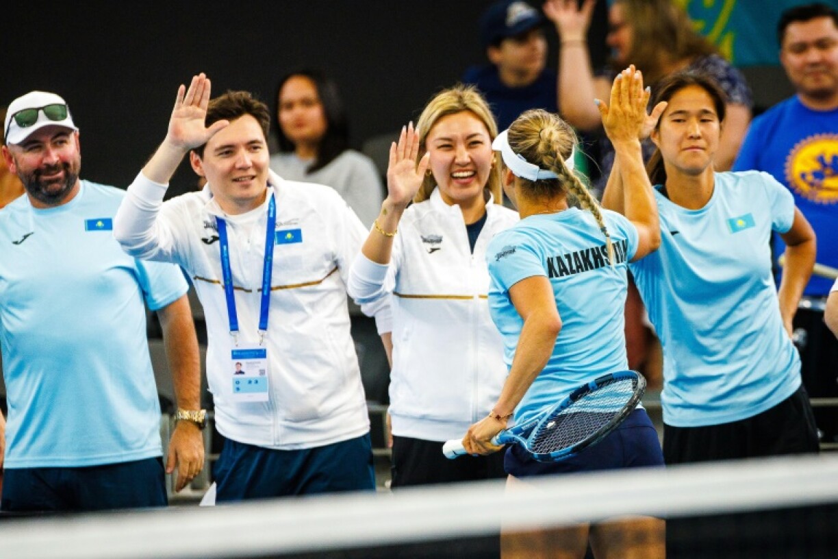 The Kazakhstan team celebrate after beating Australia in Billie Jean King Cup qualifying