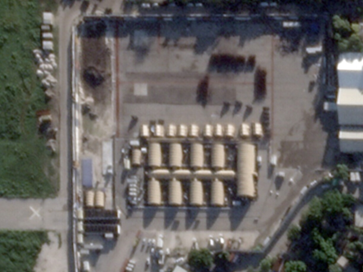 Satellite imagery shows 10 smaller tent-like structures erected next to previously installed buildings at Port-au-Prince airport