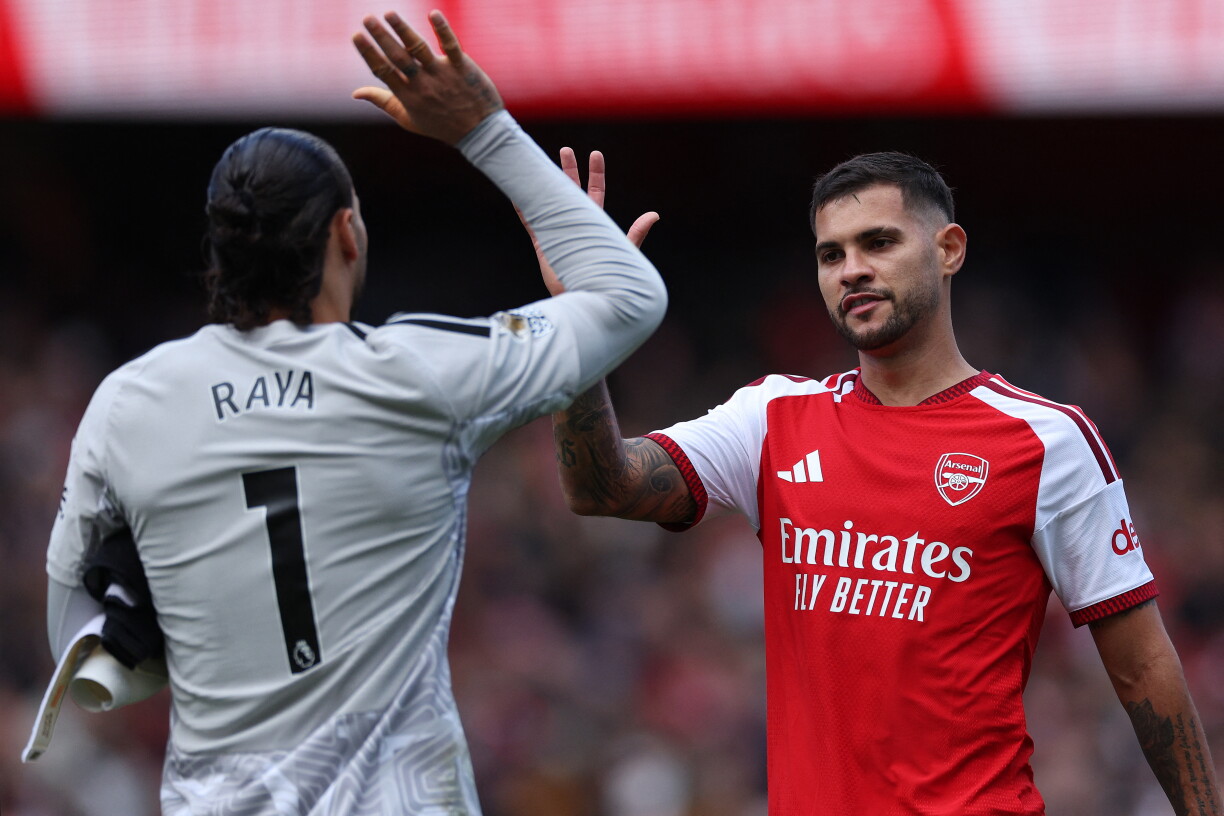 Arsenal's Spanish goalkeeper #01 David Raya (L) and Arsenal's Brazilian midfielder #39 Bruno Guimarães celebrate after the English Premier League football match between Arsenal and Leeds United at the Emirates Stadium in London on October 10, 2026.