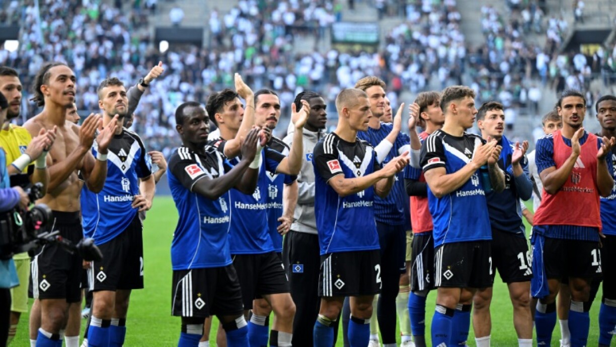 Hamburg players salute their fans after their season opener against Borussia Moenchengladbach on Sunday