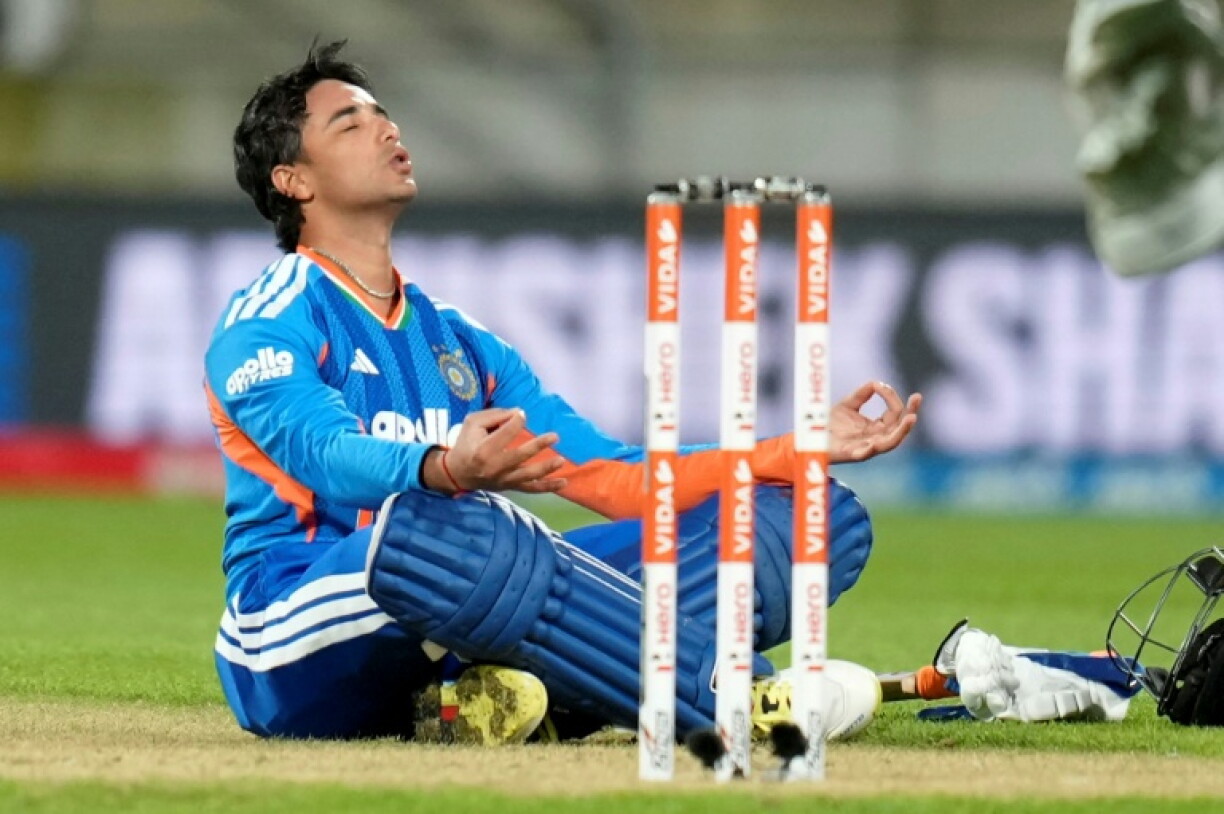 India's Abhishek Sharma celebrates after reaching his century