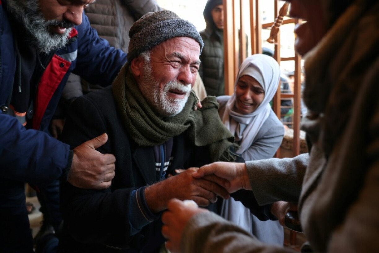 Grief-stricken relatives gather outside the Nasser Hospital in Khan Yunis following the latest Israeli air strikes on southern Gaza.