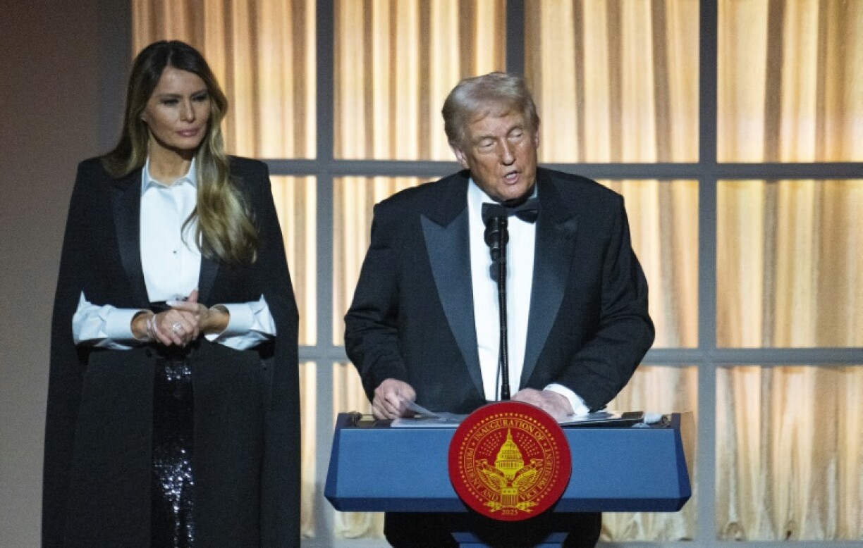 US President-elect Donald Trump and his wife Melania at a candlelight dinner at the National Building Museum in Washington, DC, on the eve of his inauguration