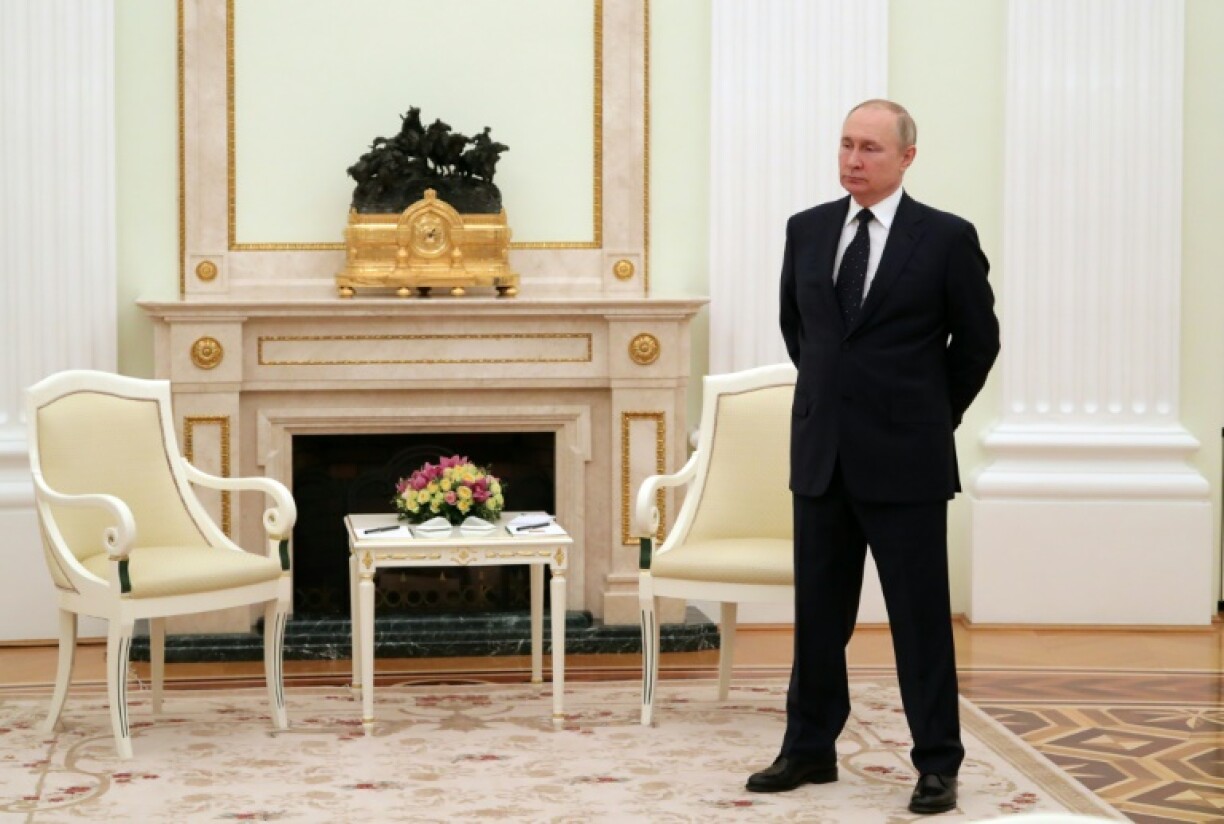 Le président russe Vladimir Poutine dans une salle du Kremlin à Moscou, le 11 mars 2022