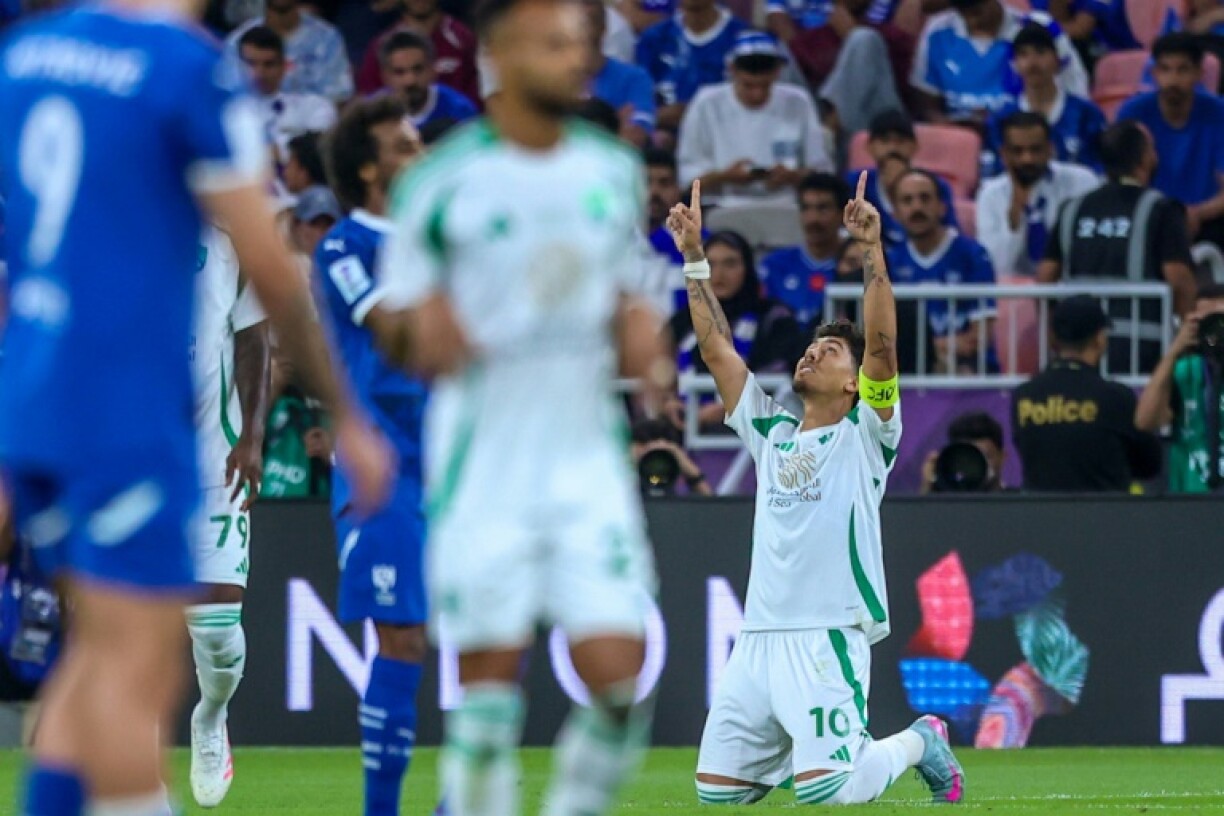 Roberto Firmino points to the sky after scoring Al Ahli's first goal in their Asian Champions League semi-final win against Al Hilal