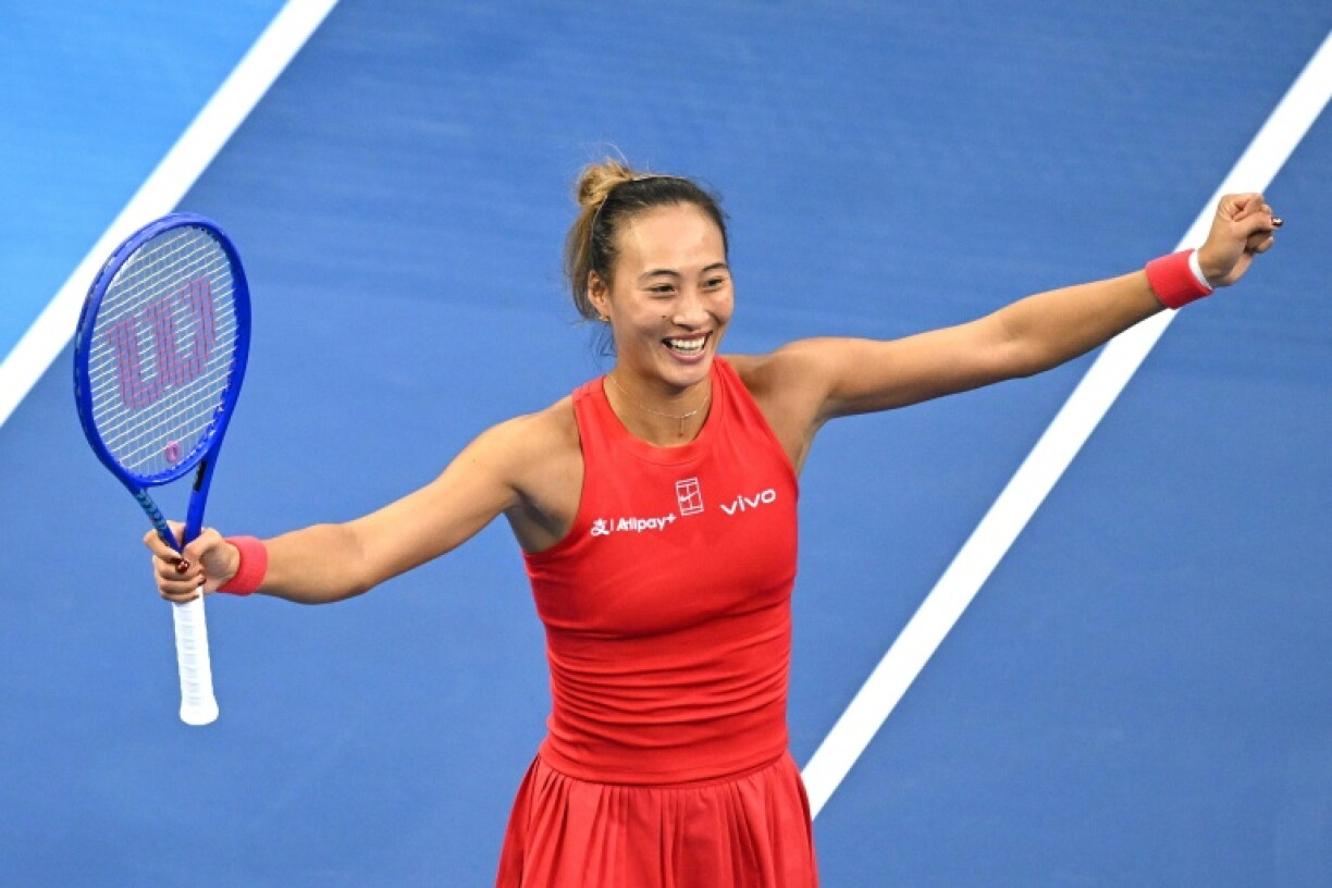 China's Zheng Qinwen celebrates beating Czech Republic’s Marie Bouzkova at the China Open tennis tournament in Beijing