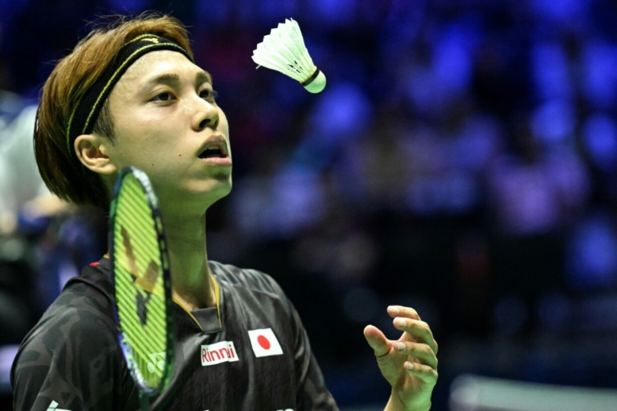 Japan's Kodai Naraoka tosses up a shuttlecock at the badminton world championships in Paris on August 28