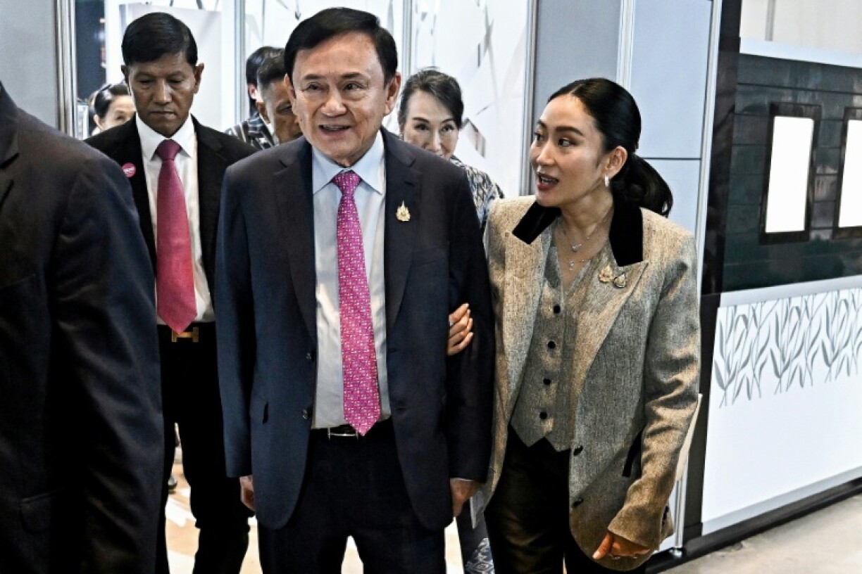 The prosecution of Thaksin (C), and the suspension of his daughter, Paetongtarn (R), represents a waning of the Shinawatra family's political fortune