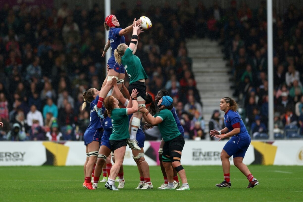France No 8 Charlotte Escudero and Ireland captain Sam Monaghan vie for the ball in a line-out during a Women’s Rugby World Cup quarter-final in Exeter