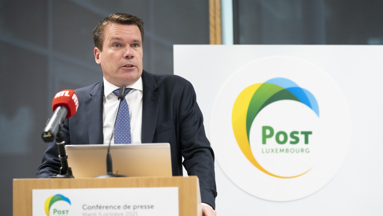 De Claude Strasser, Generaldirekter vun der Post.