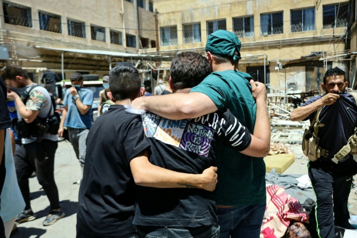 Hospital staff said they were overwhelmed by the number of bodies from the fighting