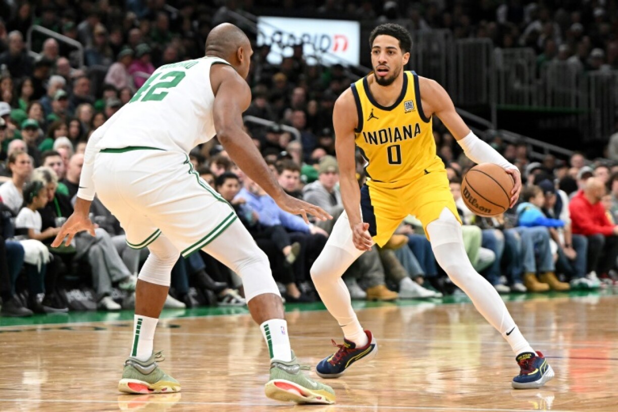 Indiana's Tyrese Haliburton drives against Al Horford in the Pacers' NBA victory over the Boston Celtics