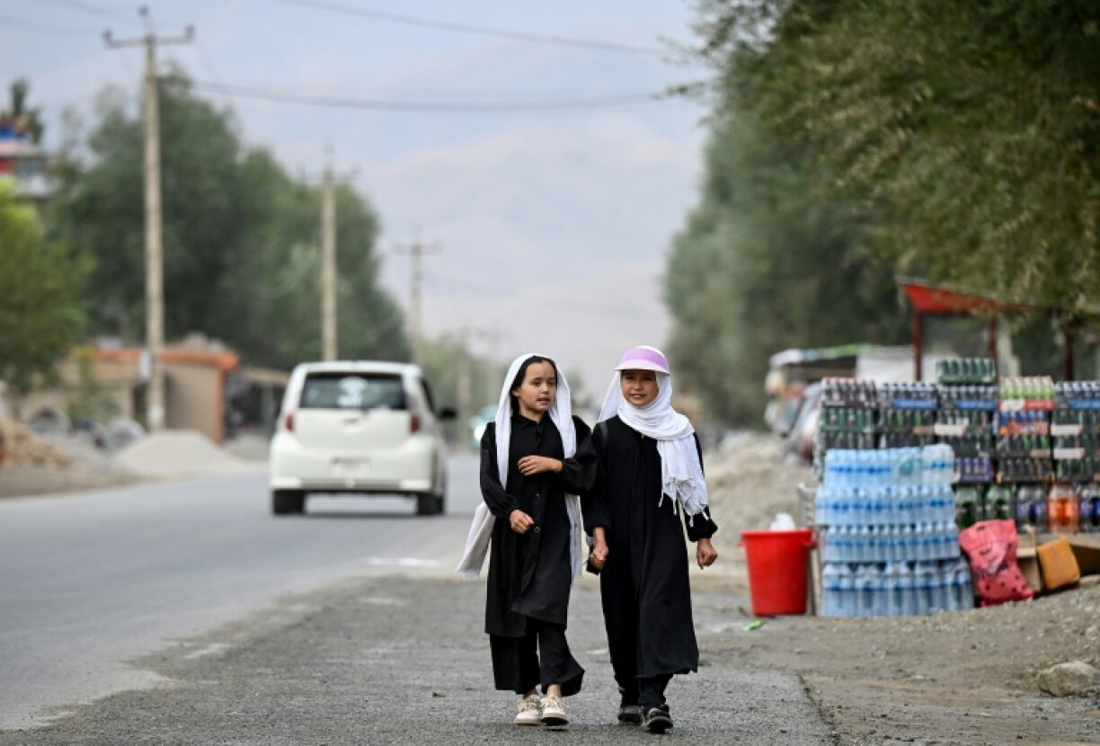 Afghan girls are banned from attending school above primary level