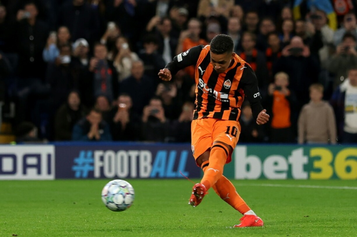 Shakhtar Donetsk midfielder Pedrinho scores from the penalty spot at Stamford Bridge