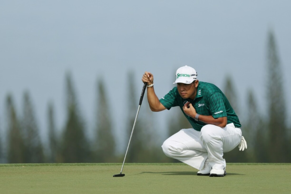 Japan's Hideki Matsuyama lines up a putt on the way to the 54-hole lead in the US PGA Tour Sentry Tournament