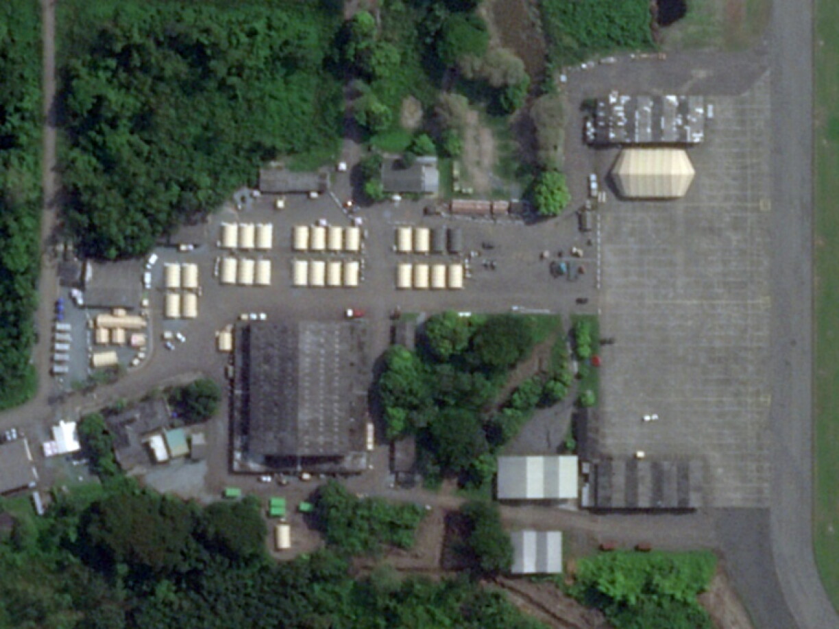 This handout satellite image captured by Planet Labs PBC on October 10, 2026, and analysed by AFP, shows structures whose shape and dimensions are consistent with rapidly deployable modular tents, as well as a larger structure resembling a retractable aircraft maintenance hangar tent, at the Ecuadorean military air base of Taura