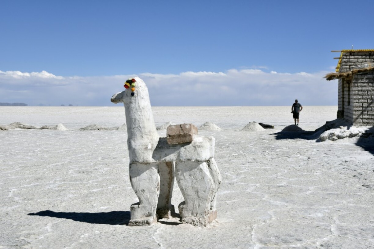 A sculpture is seen at the Uyuni salt flat in Bolivia, where dense earth makes it harder to mine the metal compared to operations in competitor Chile ;t, the world's largest salt flat, in Uyuni, southern Bolivia, on November 9, 2016. In the heart of the ‘lithium triangle,’ located between Chile, Argentina, and Bolivia, a strategic battle is being fought to exploit this key metal in the energy transition. The first two are already major players, while Bolivia is stumbling to enter the global race.