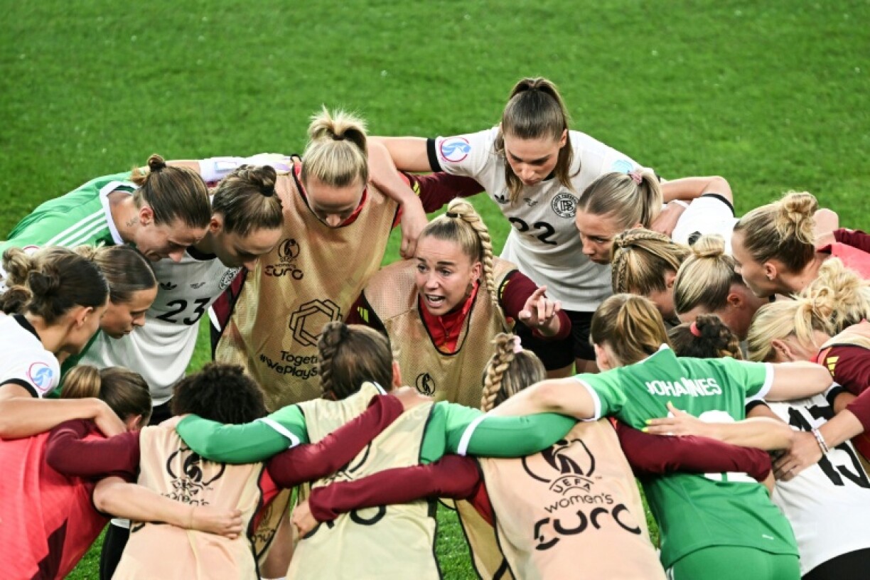 Germany captain Giulia Gwinn gives a team talk in her side's clash with Spain in July