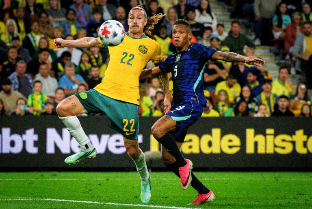 Brazil's Danilo Santos (R) and Australia's Jackson Irvine compete for the ball during the international friendly football match between Australia and Brazil at Suncorp Stadium in Brisbane on September 29, 2026.