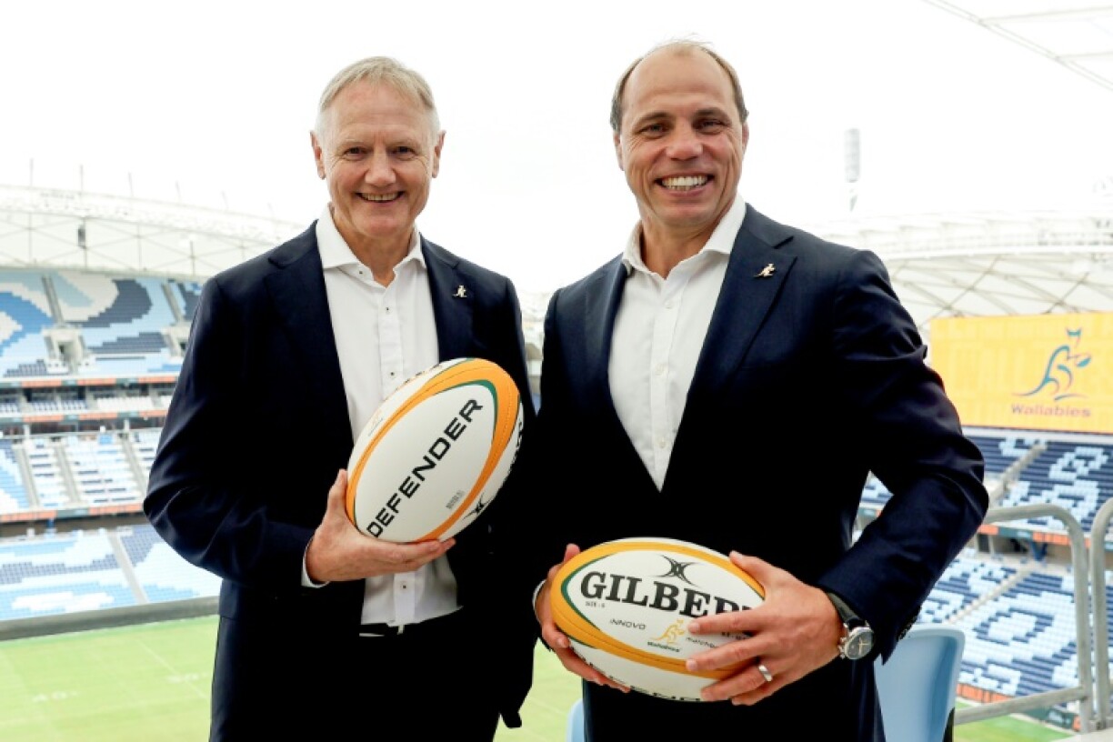Wallabies coach Joe Schmidt (L) and Rugby Australia CEO Phil Waugh (R) are reluctant to release too many top players for Lions tour games
